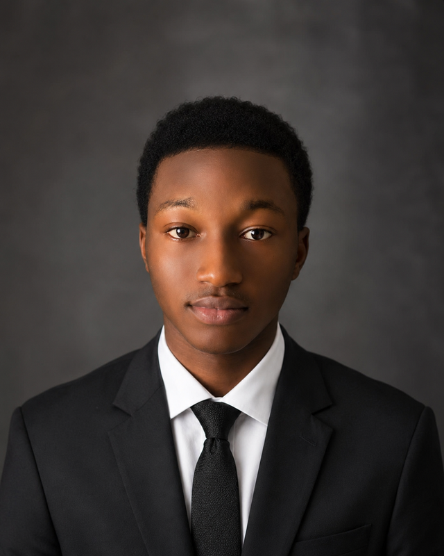 Portrait of Olaide Abdulbasit, founder of Adecomlytic